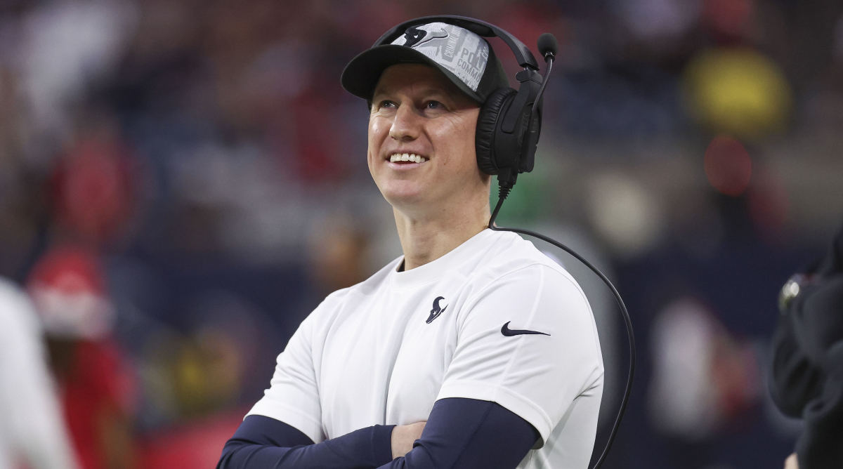 Texans offensive coordinator Bobby Slowik smiles